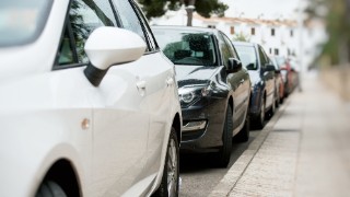 image of cars parked along residential street