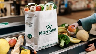 Pictures to show how Morrisons is giving customers the option of using large paper carrier bags in eight of its stores from this week. The trial is a response to customers who have told Morrisons reducing plastic is their number one environmental concern. The new US-style paper grocery bags have handles and are a similar capacity to standard plastic carrier bags. They are 100% PEFC accredited meaning they are sourced from forests that are managed responsibly.
Priced at 20p each the paper grocery bags, which can be reused and ultimately recycled, are labelled 'Reusable Paper Bag'. As part of the trial, Morrisons is also increasing the price of standard plastic carrier bags from 10p to 15p to further reduce plastic use. This follows Morrisonsâ removal of the 5p carrier bags early in 2018 which led to 25% reduction in overall bag sales. This 15p standard plastic carrier bag is produced in the UK and is made from recycled material reclaimed from Morrisons stores.
For more information, please contact the Morrisons press office at The Academy on 020 7100 7100 or morrisons@theacademypr.com