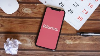 Barcelona, Spain - June 06, 2020; Klarna Iphone Screen with Calendar and Squeezed Paper. Klarna is a Swedish bank that provides online financial services. #Klarna