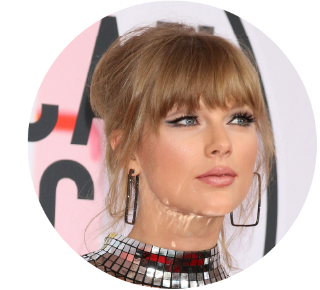 Taylor Swift Close up of Taylor Swift with her hair up and wearing large rectangle earrings.