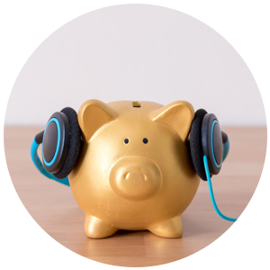 Piggy bank wearing headphones.