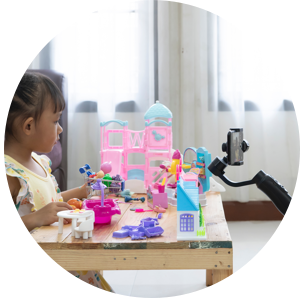 Little girl making a toy review video Little girl making a toy review video.