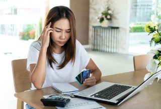 woman paying off debt