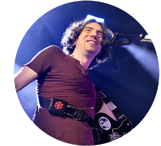 Gary Lightbody of Snow Patrol smiling onstage Gary Lightbody of Snow Patrol smiling onstage.