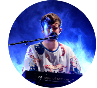 James Blake playing live onstage Close up of James Blake playing live onstage.