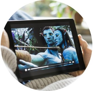 Close up of someone watching Avatar on a tablet they're holding on their lap