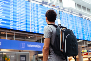 guy checking flight times
