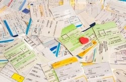 Photo of assorted train tickets mixed together.
