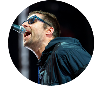 Close up of Liam Gallagher singing onstage.
