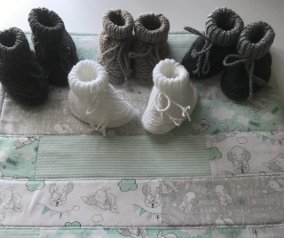 Knitted white and grey booties