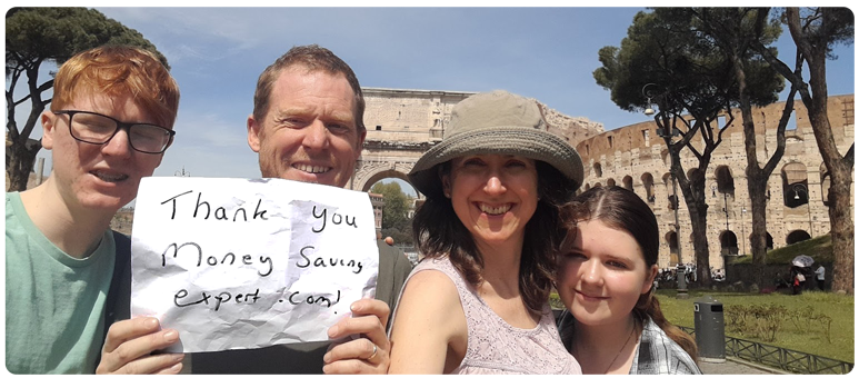 A photo of MoneySaver Simon and his family on holiday in Rome, with the Colosseum in the background. Simon holds a handwritten note saying: "Thank you MoneySavingExpert.com!" Image links to our guide titled Can you make £1,000s by repeatedly switching bank?