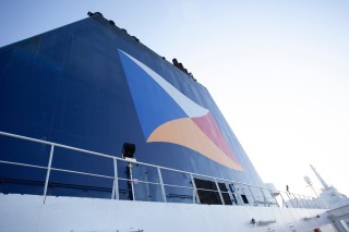 Calais, France / September, 2019 / A shot of the P&O cruise company ferry, on-board looking up at the company logo.